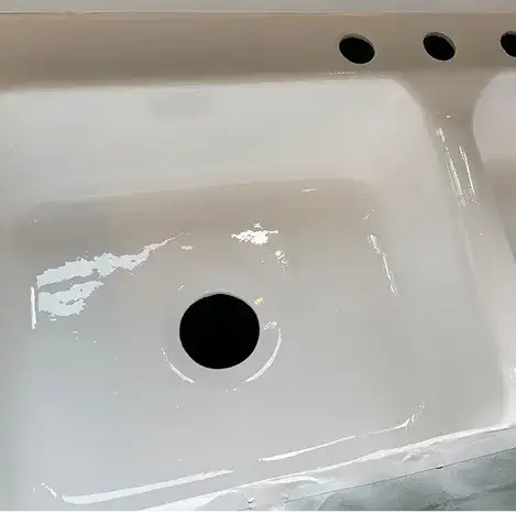 White double basin sink with three faucet holes